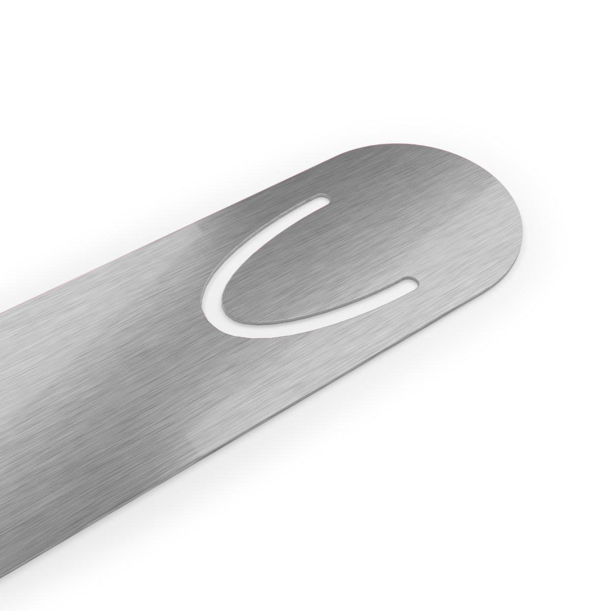 Close up of backside of book mark - silver metal curved.
