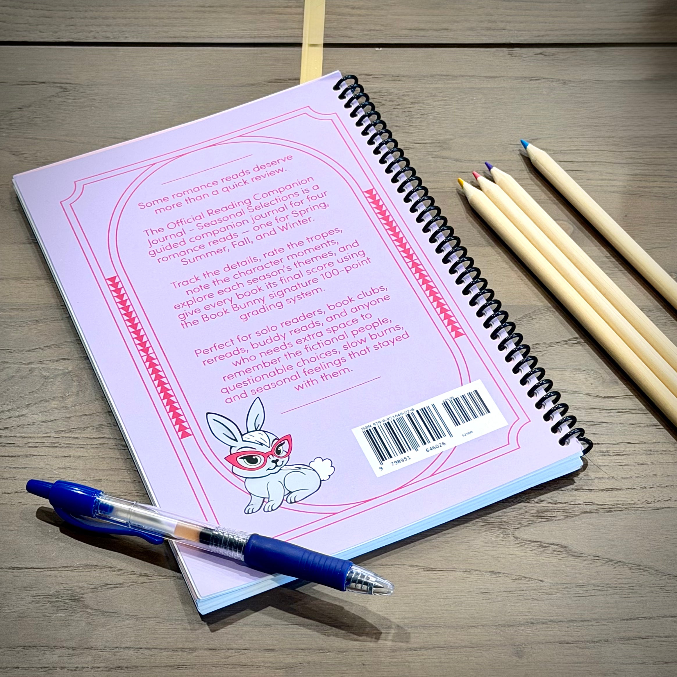 Back cover of the lavender Book Bunny™ Seasonal Selections journal with product description, Book Bunny character artwork, and barcode.